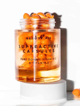 Image may contain Jar Bottle Cosmetics Perfume and Tape