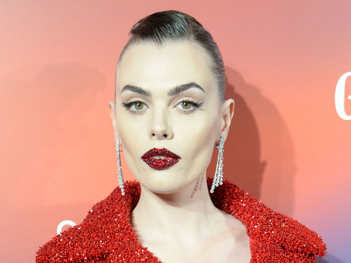 Charli Howard wore red sequin lips to match her red sequin suit at the GLAMOUR Women of the Year Awards