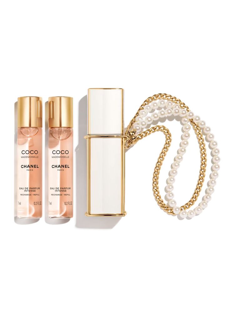 Image may contain Bottle Cosmetics Accessories Jewelry Necklace Perfume and Lipstick