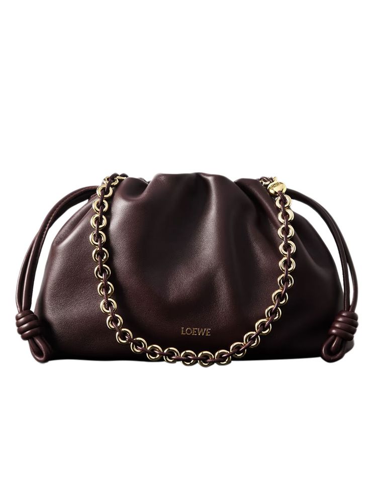 Image may contain Accessories Bag Handbag Purse Jewelry and Necklace
