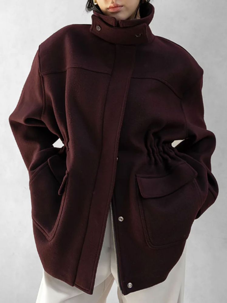 Image may contain Clothing Coat Jacket and Fleece