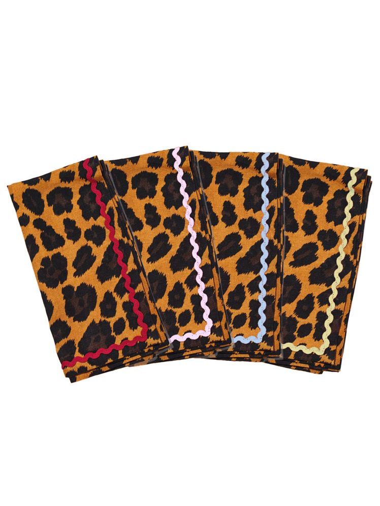 Image may contain Home Decor Cushion Rug Accessories Formal Wear and Tie
