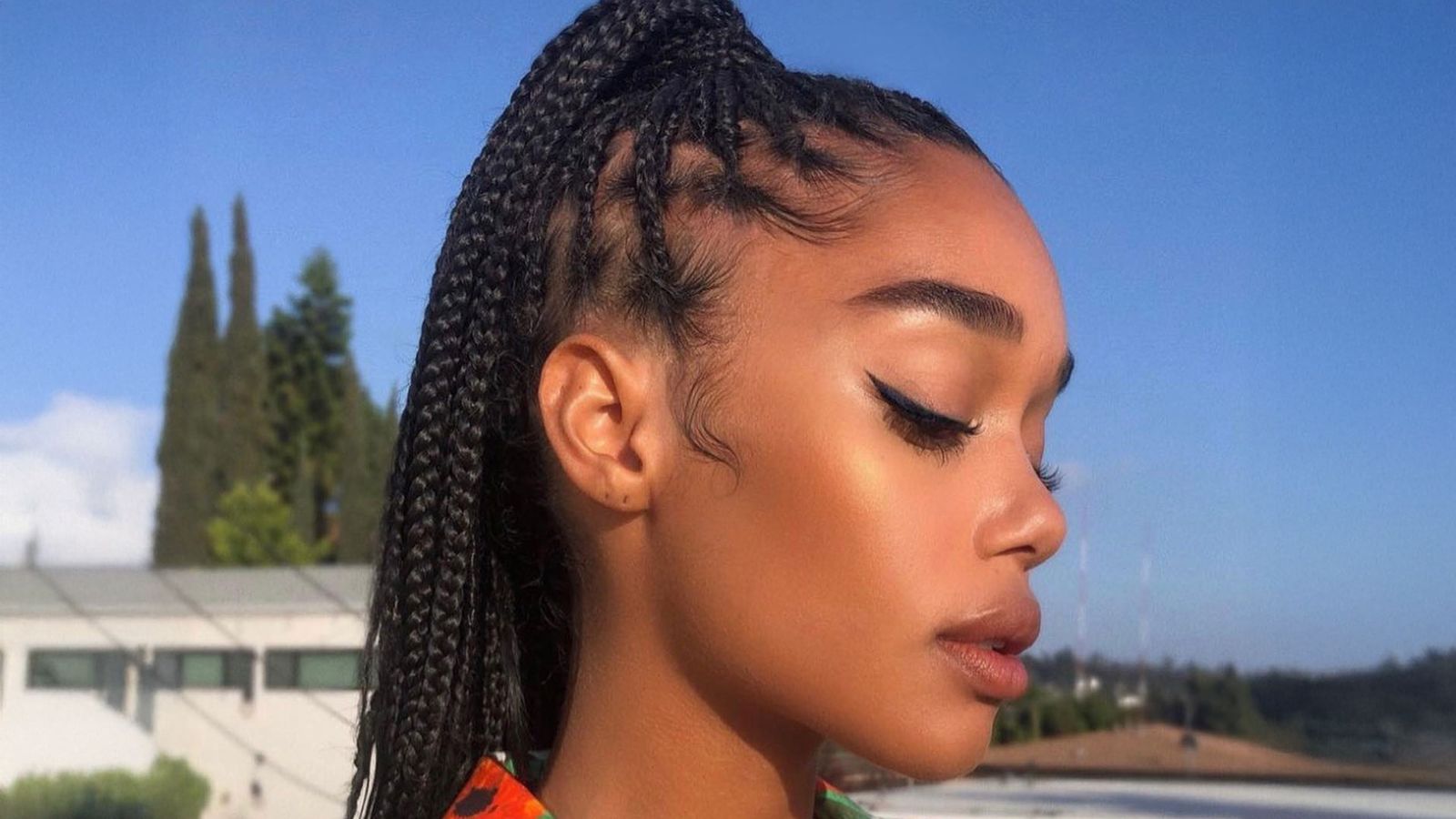 Image may contain: Laura Harrier, Person, Teen, Hair, Head, and Face