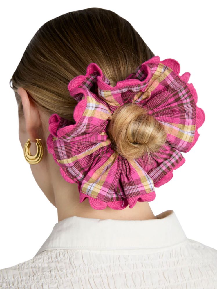 Image may contain Accessories Child Person Bun  and Hair