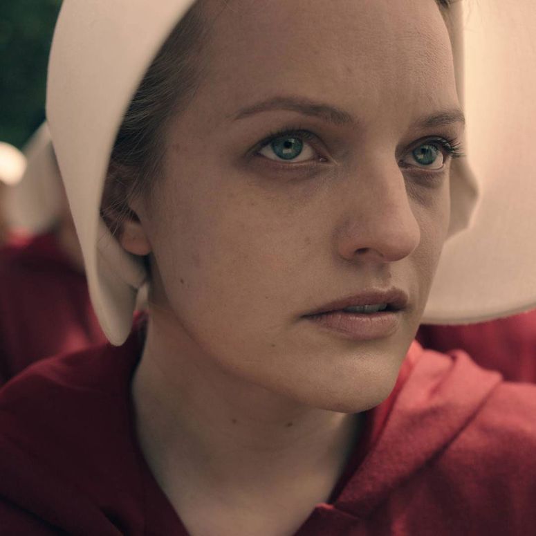 Image may contain: Elisabeth Moss, Photography, Clothing, Hat, Face, Head, Person, Portrait, and Adult